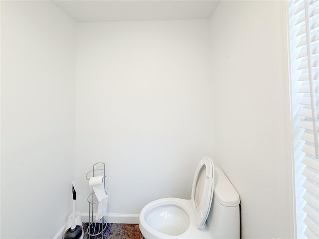 bathroom featuring toilet