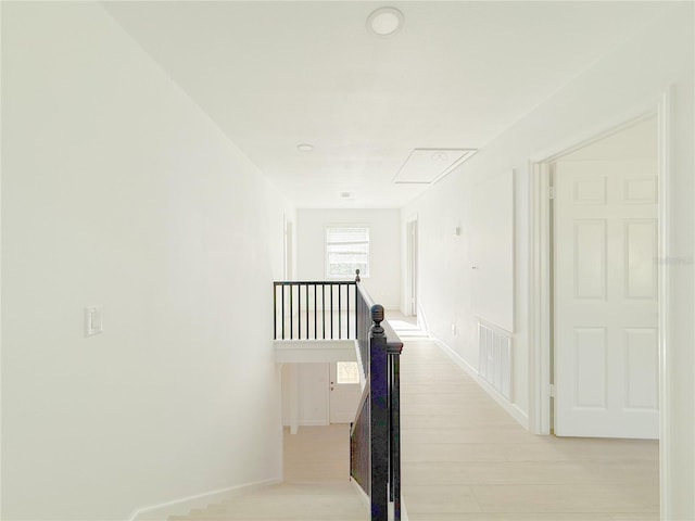 staircase featuring hardwood / wood-style flooring