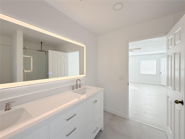 bathroom featuring vanity and ceiling fan