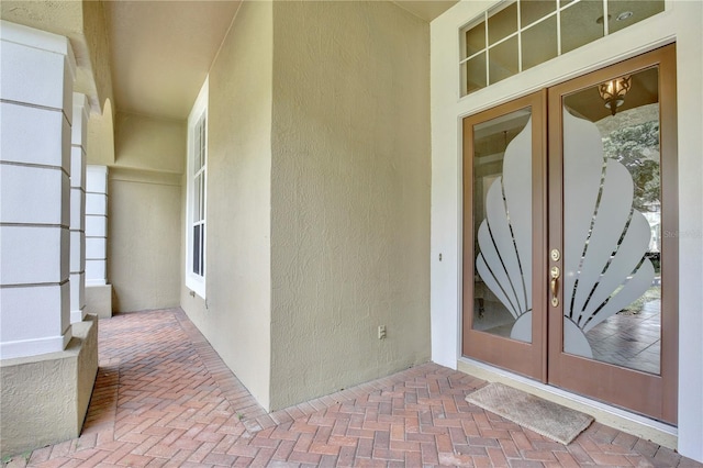 entrance to property featuring french doors