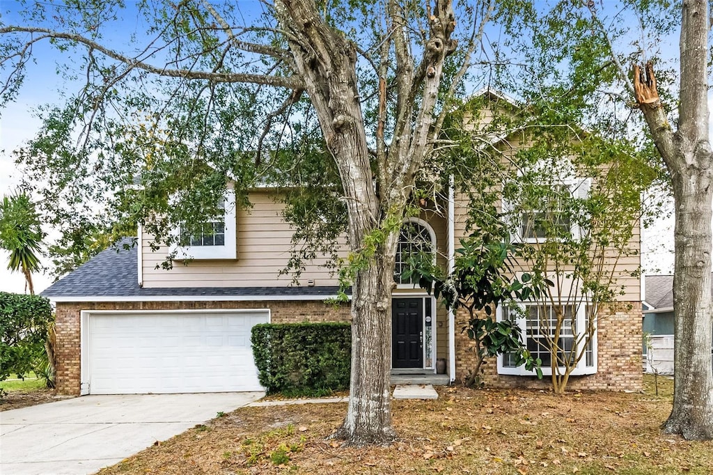 view of front of property with a garage