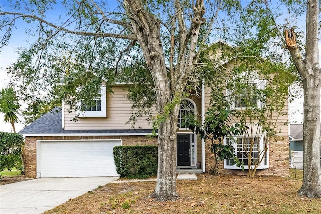 view of front of property with a garage