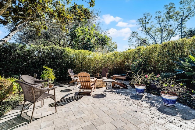 view of patio / terrace featuring a fire pit