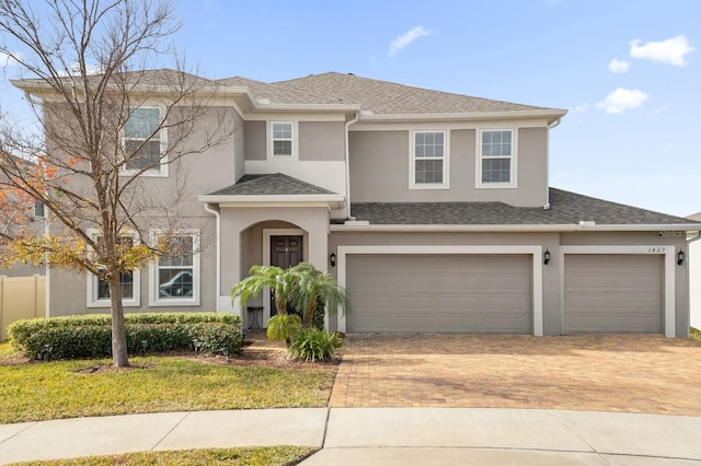 view of front of property featuring a garage