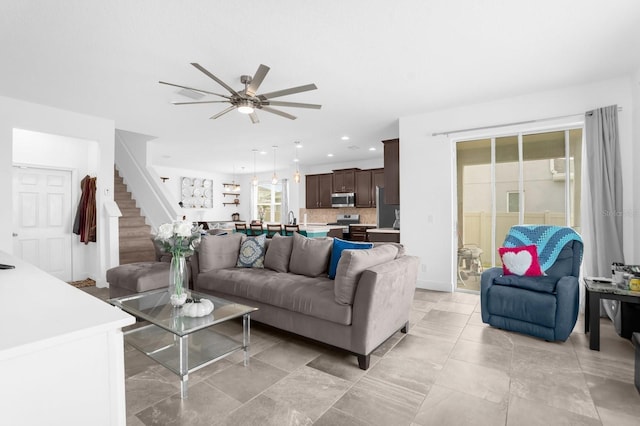 living room featuring ceiling fan