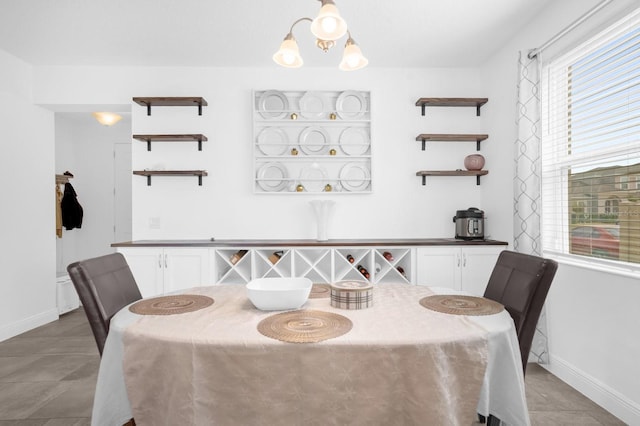 dining room featuring a chandelier