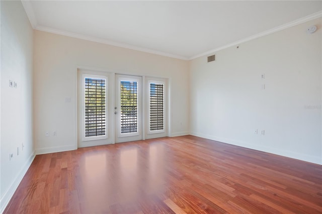 630 Vassar St Unit 2310, Orlando, FL 32804 - unfurnished room featuring hardwood / wood-style flooring and ornamental molding