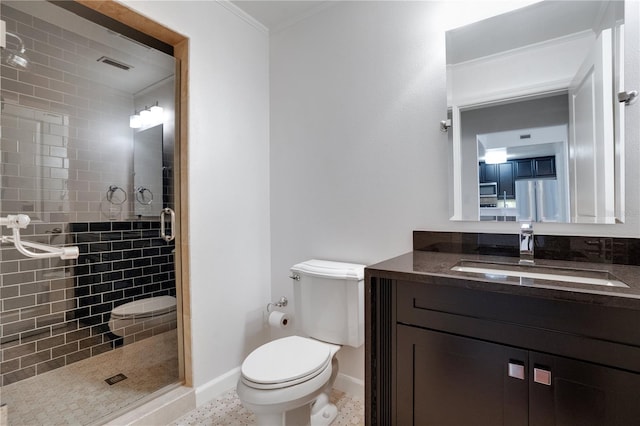 630 Vassar St Unit 2310, Orlando, FL 32804 - bathroom featuring ornamental molding, toilet, a shower with door, and vanity