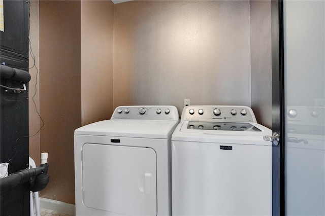 630 Vassar St Unit 2310, Orlando, FL 32804 - clothes washing area with independent washer and dryer