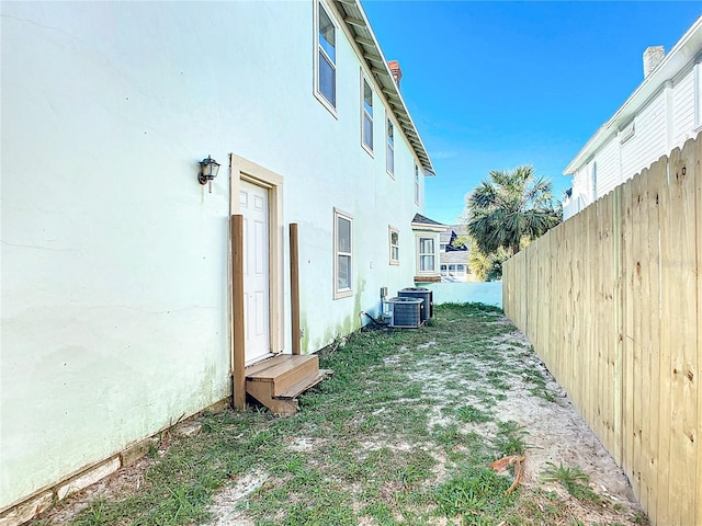 view of yard featuring central AC unit