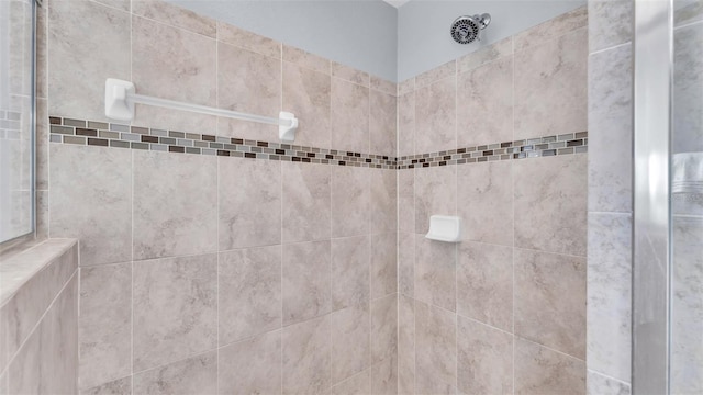 room details with a tile shower