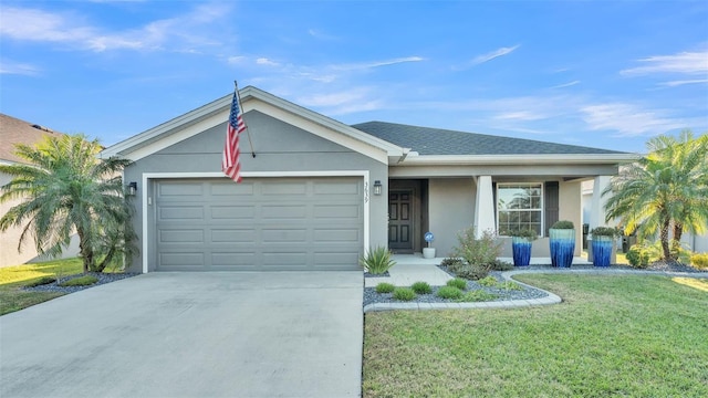 ranch-style house with a front lawn, covered porch, and a garage