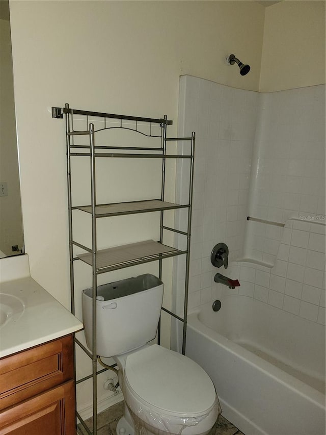 full bathroom with vanity, shower / bathtub combination, and toilet