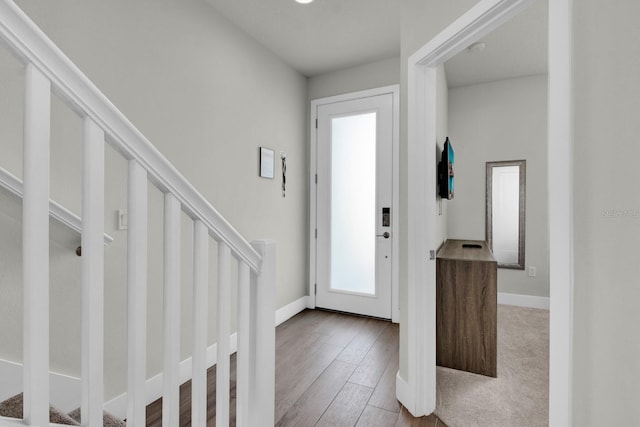 foyer with light wood-type flooring