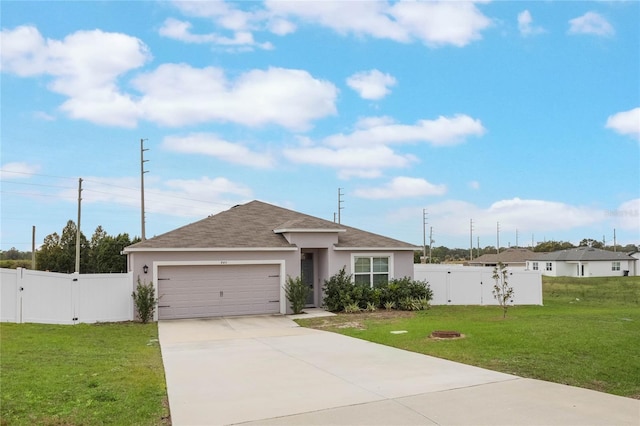 ranch-style home with a garage and a front lawn