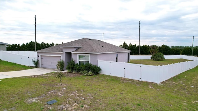 single story home featuring a front yard and a garage