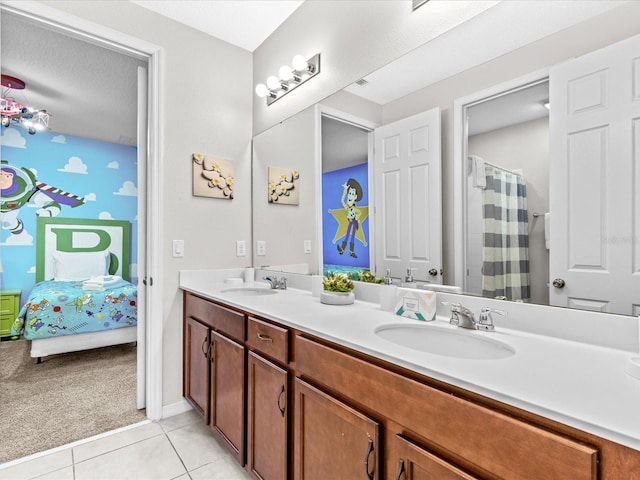 bathroom with vanity and tile patterned floors