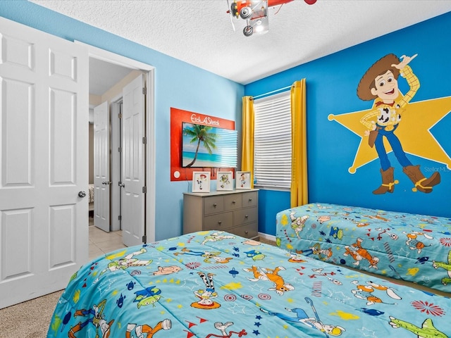 bedroom with a textured ceiling