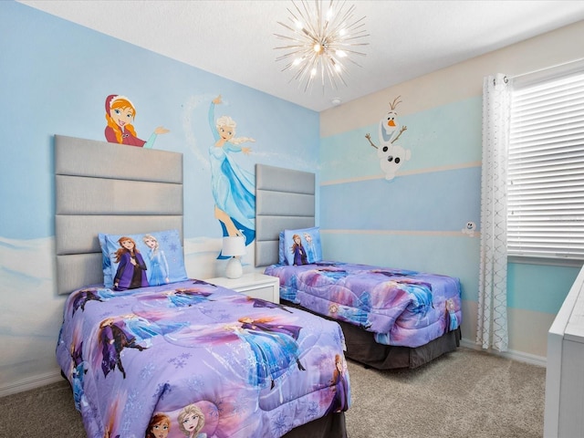 bedroom with carpet floors and a notable chandelier