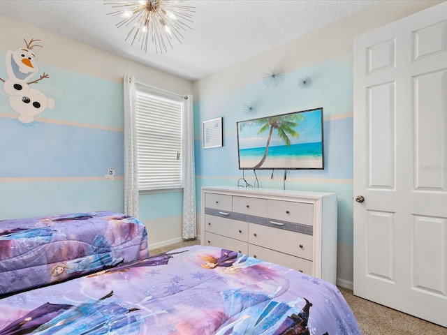 bedroom with a textured ceiling, light colored carpet, and a chandelier