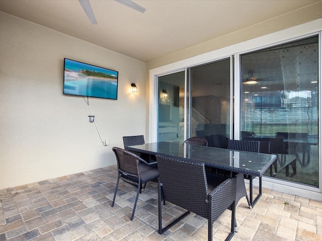 view of patio featuring ceiling fan