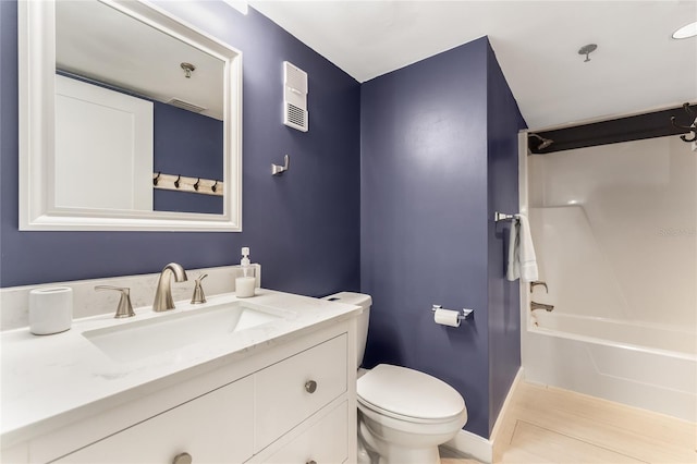 full bathroom featuring vanity, toilet, and shower / bathing tub combination