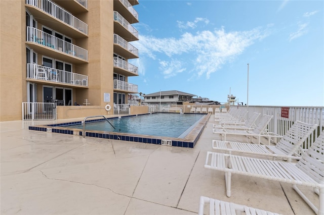 view of pool with a patio area