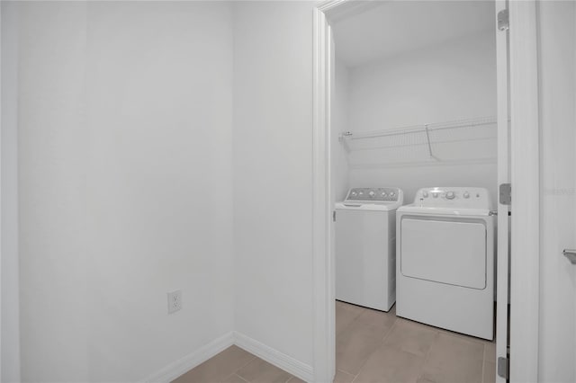 washroom with washer and clothes dryer