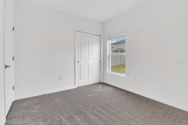 empty room with carpet floors