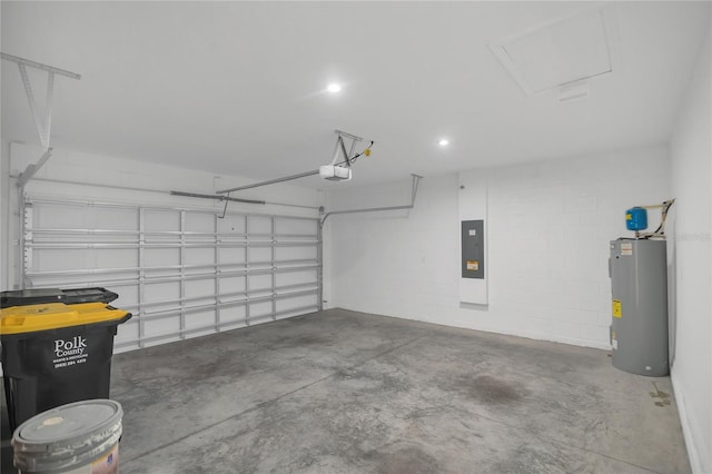 garage featuring a garage door opener, electric panel, and electric water heater