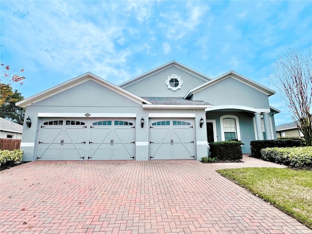 view of front of home featuring a garage