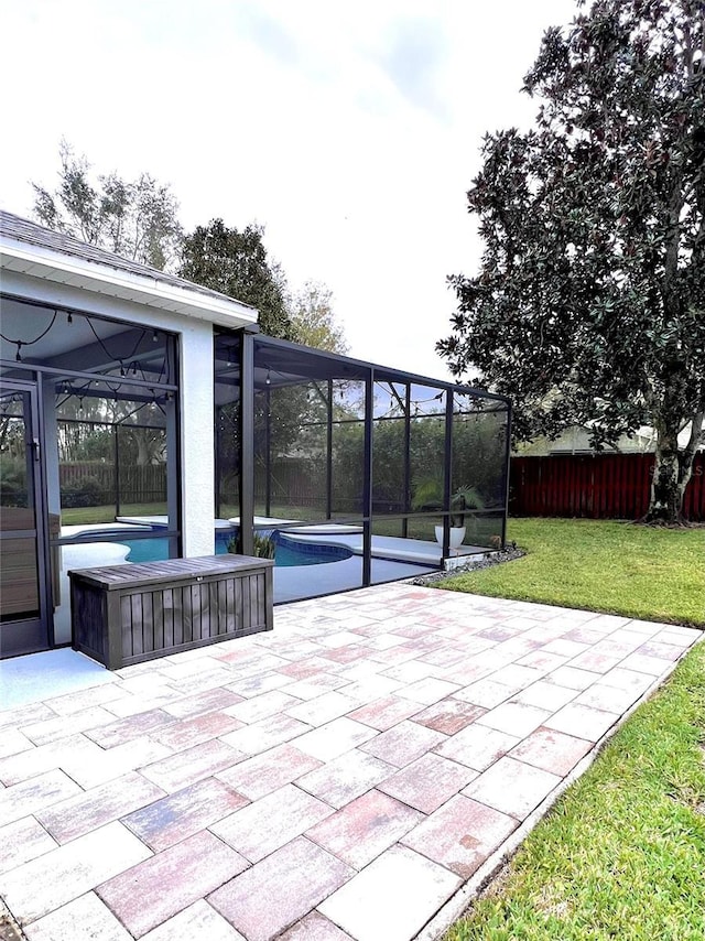 view of patio / terrace with a lanai