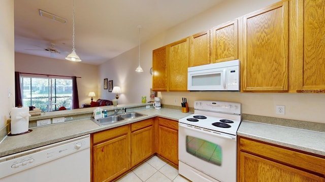 kitchen featuring white appliances, ceiling fan, sink, light tile patterned floors, and decorative light fixtures