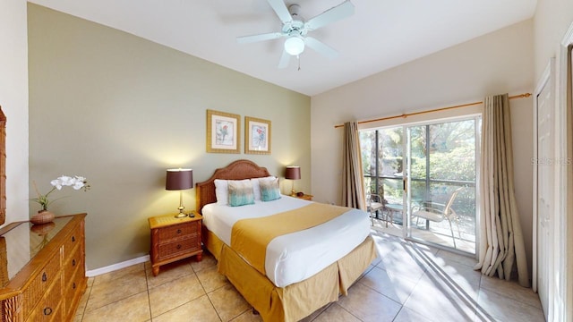 tiled bedroom with ceiling fan and access to exterior