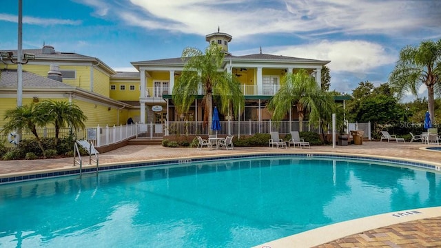 view of pool featuring a patio