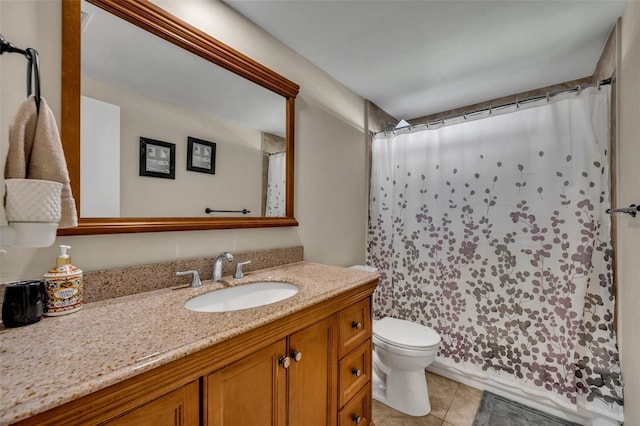 bathroom featuring tile patterned floors, a shower with curtain, vanity, and toilet