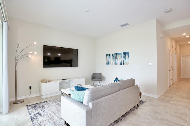 living room featuring light tile patterned floors