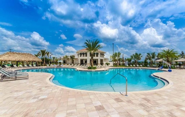 view of swimming pool featuring a gazebo and a patio