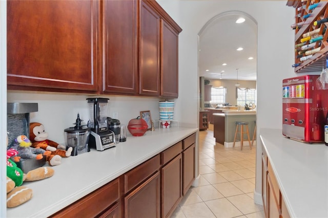 kitchen with light tile patterned floors