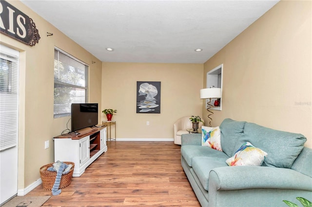 living room with light hardwood / wood-style floors