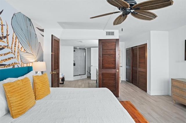 bedroom with ceiling fan, light wood-type flooring, and a closet