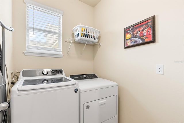 laundry room featuring washer and clothes dryer