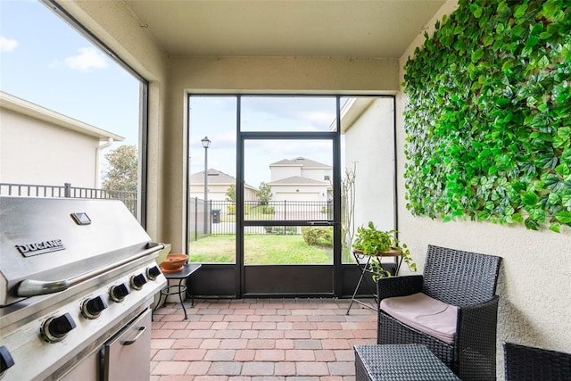 sunroom / solarium featuring a wealth of natural light