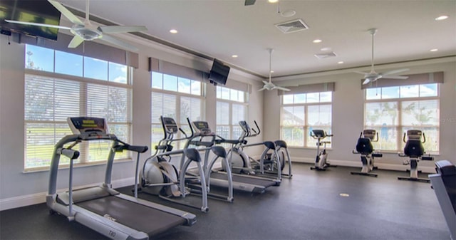 exercise room with ceiling fan