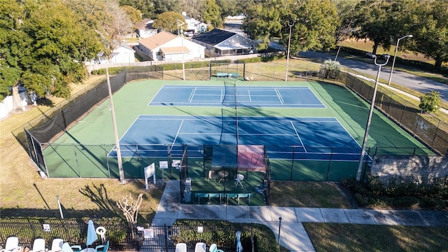 view of sport court featuring basketball hoop