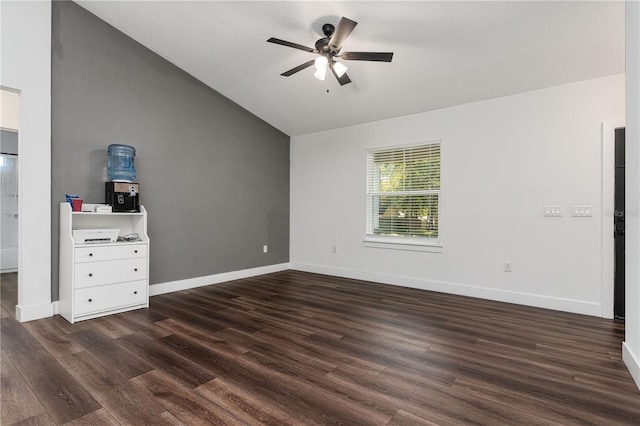 unfurnished bedroom with vaulted ceiling, ceiling fan, and dark hardwood / wood-style flooring