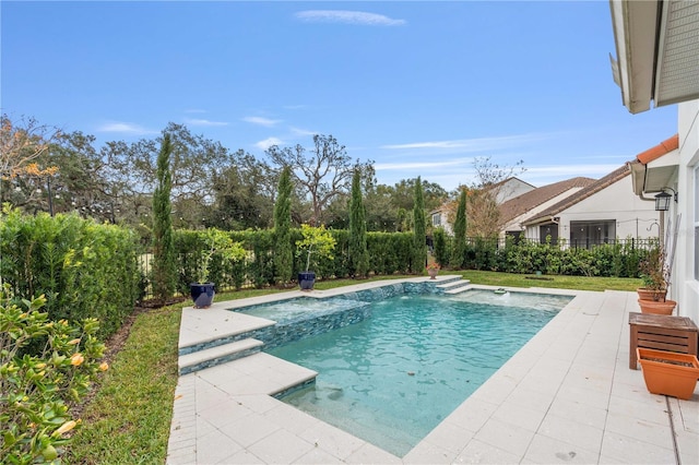 view of swimming pool featuring a patio and pool water feature