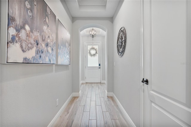 hall with light hardwood / wood-style flooring