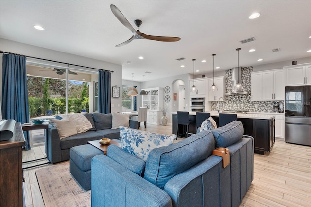 living room with light hardwood / wood-style flooring