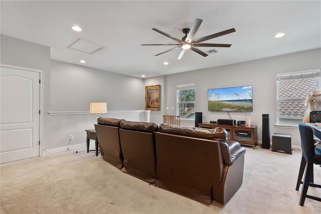 living room featuring ceiling fan and light carpet